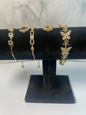 4-piece jewelry set, 3 bracelets with 1 pair earrings, all gold tone and pretty